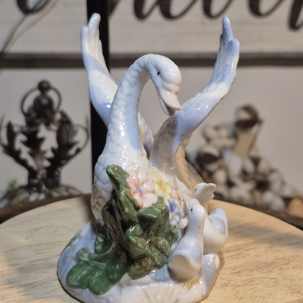 Elegant Porcelain Swan Figurine with Ducklings